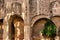 Ancient stonework and arches of an old historic building in the Gothic District of Barcelona