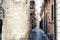 Ancient street with old houses on Ortygia Island, Syracuse Siracusa, Sicily