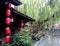 A ancient street with red chinese lanterns after mild rain