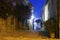 Ancient streets at night in the city `Castiglione della Pescaia`.