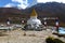 Ancient stupa in Dingboche, with prayer flags, Everest Base Camp trek, Nepal