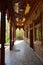 Ancient style corridor with beautiful wooden carving in the wealthy house of Ba Yi, Turpan Grape Valley, Xinjiang Province China