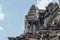 Ancient temple Angkor Wat entrance view. Buddhist or hindu temple Angkor Wat on sky background.