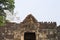 Ancient temple in Angkor Wat. Preah Khan temple entrance bas-relief stone carving. Buddhist or hindu temple.