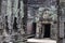 Ancient temple in Angkor Wat. Preah Khan temple mossy stone bas-relief ornament. Buddhist or hindu temple.