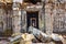 Ancient temple stone wall and entrance ruins, Angkor Wat