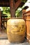 Ancient Thai style glazed water jar with dragon pattern
