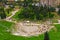 Ancient Theater of Dionysus seen from the hill of Athens Acropolis. Ancient ruins