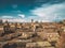 Ancient tombs in the historical cemetery of Noratus in Armenia under blue cloudy sky