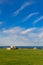 Ancient trulli, countryside, sea and clouds in Puglia