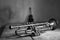 An ancient trumpet and a guitar on an old wooden table