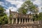 Ancient two-storied building with round columns of Preah Khan th