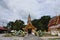 Ancient ubosot church and ruin stupa or chedi and antique naga statue for thai people travel visit praying blessing holy mystery