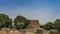 The ancient unfinished brick minaret Ala-i-Minar in the temple complex Qutb-minar.