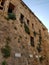 Ancient uninhabited narrow stone building in Jerusalem