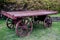 Ancient vehicle, cart on a background of green grass