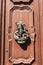 Ancient Venetian door with old door knob close-up