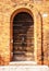 Ancient Venetian wooden door at night.