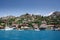 Ancient village of Simena with castle on mountain. Boat dock, beautiful landscape