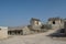 Ancient village street view with small huts