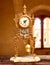 Ancient vintage golden brass pendulum clock