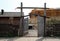 Ancient vintage wooden house and gate in the old mediaeval fort