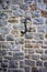 An ancient wall tie anchor in the village of Avebury in Wiltshire, England