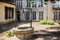 Ancient well head with pulley in courtyard behind Cathedral in Chalon sur Saone, Burgundy, France