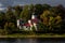 An ancient white Orthodox Christian church on the banks of the Velikaya River in the city of Pskov. Landmark of Russia