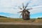 Ancient windmill on the field. Ukraine