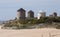 Ancient Windmills in Apulia Beach.