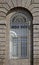 Ancient window with ornamental grid in downtown Rio de Janeiro