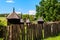 Ancient wooden beehives in old rural apiary