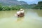 Ancient wooden boat parked in the river