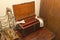 Ancient wooden box with cells for medicines and a bottle stand