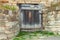 Ancient Wooden doors and stone wall. Ukraine, Pirogovo museum