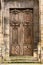 Ancient wooden entrance door to the Basilica of Saint Denis. Saint-Denis, France