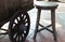 Ancient wooden wheeled cart and chair