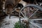 An ancient and wrecked carriage lying in an ancient monastery