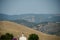 Andalusia picturesque hilly countryside panorama with olive trees groves on cultivated fields in southern Spain, Malaga