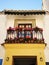 Andalusian balcony with pots of geraniums in Ronda, Malaga province, Spain