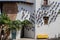 Andalusian Neighbourhood, White Wall with Hanging Vases of Spanish Flowers in Poble Espanyol, Barcelona, Spain