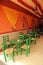 Andalusian tables and chairs inside a family caseta (booth) at the April Fair in Seville, Spain.