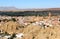 Andalusian town Guadix between mountains in Spain