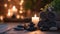 ?andles, stones and towel in a spa, Burning candles, stones and towel on massage table