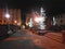 Andorra la Vella - a path with streetlights and trees with lights at night.