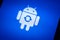 Android robot logo icon on the smart phone screen during update installation