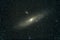 The Andromeda Galaxy , also known as Messier 31, and originally the Andromeda Nebula is a barred spiral galaxy, nearest to the