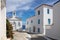 Andros island, Chora town, Cyclades Greece. Agia Varvara white orthodox church, sea sky sunny day