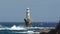 Andros lighthouse in a rough sea day